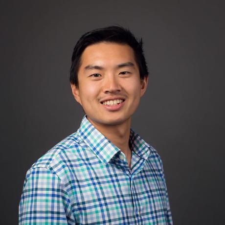Harrison Tsai smiling in a blue checked shirt